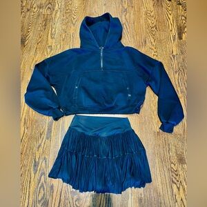 Blogilates black sweatshirt and see thru skirt with biker shorts